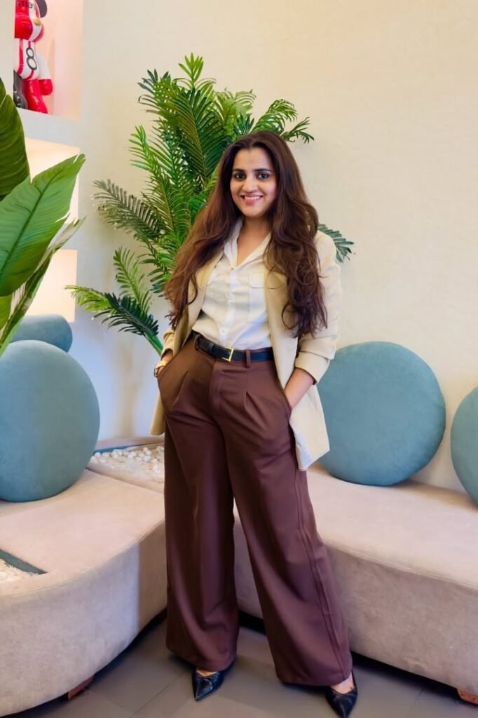 Beige Blazer + White Button-Down Shirt + Chocolate Brown Wide-Leg Trousers + Black Pointed-Toe Heels