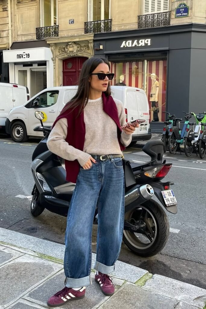 Beige Crew-Neck Sweater + Burgundy Shoulder-Draped Sweater + Baggy Cuffed Jeans + Burgundy Suede Sneakers