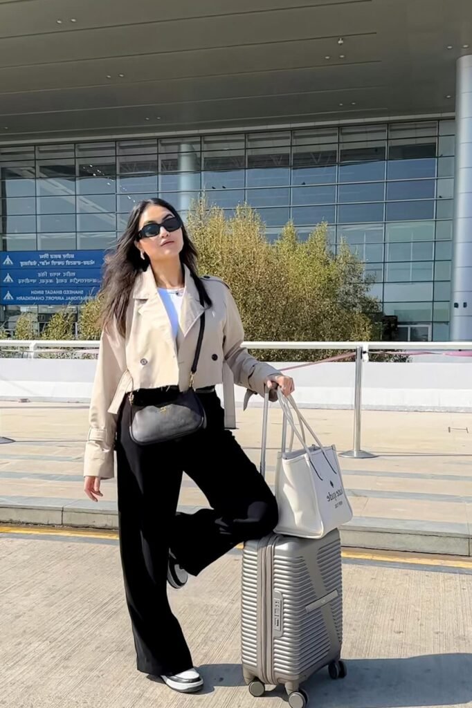 Beige Cropped Trench Coat + White T-Shirt + Black Wide-Leg Trousers + Black and White Sneakers