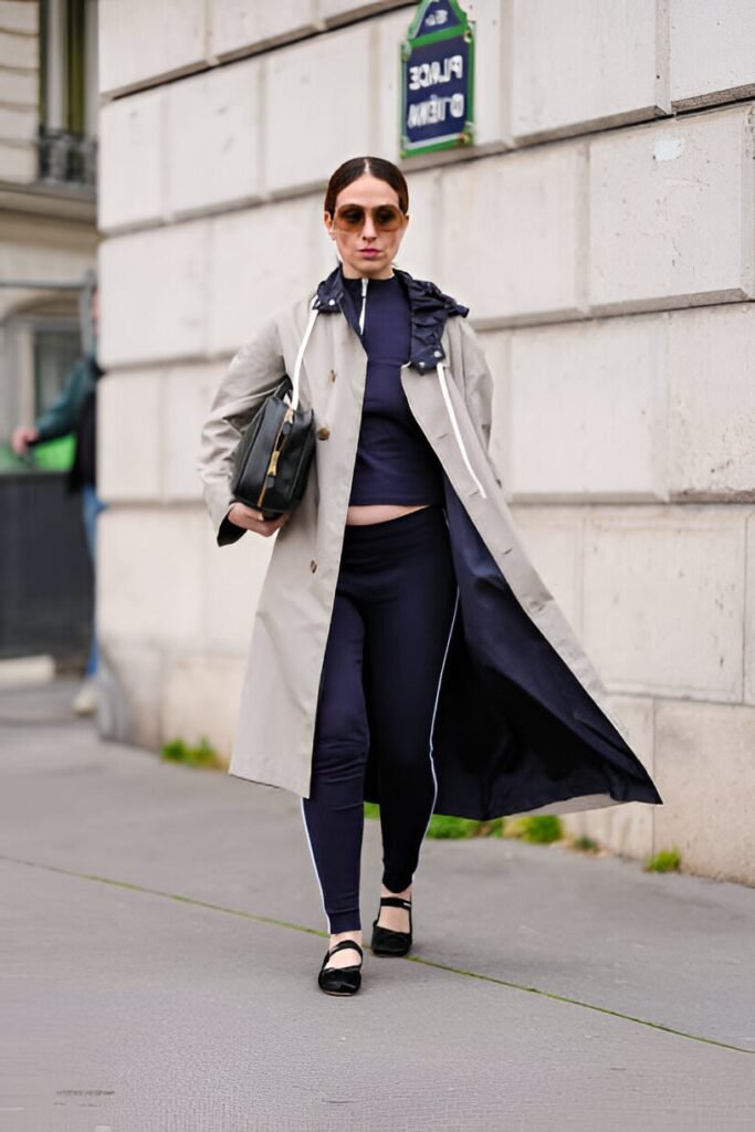 Beige Overcoat + Navy Quarter-Zip Top + Navy Side-Stripe Leggings + Black Ballet Flats