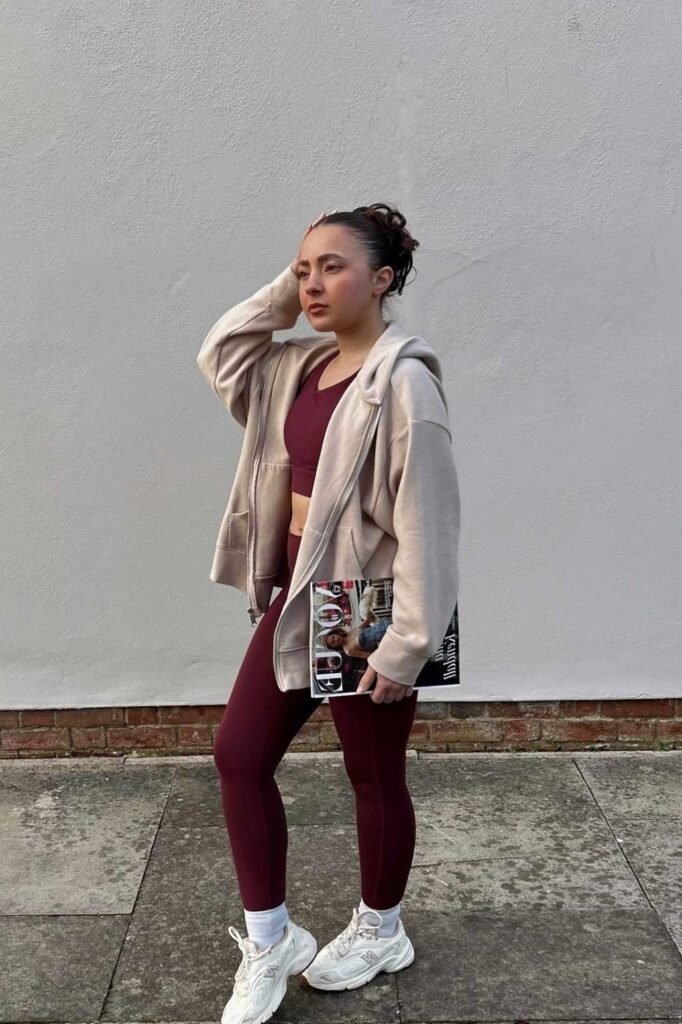 Beige Oversized Zip-up Hoodie + Burgundy Sports Bra & Leggings + White Sneakers