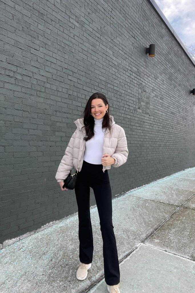 Beige Puffer Jacket + Black Flared Leggings + Cream Sneakers