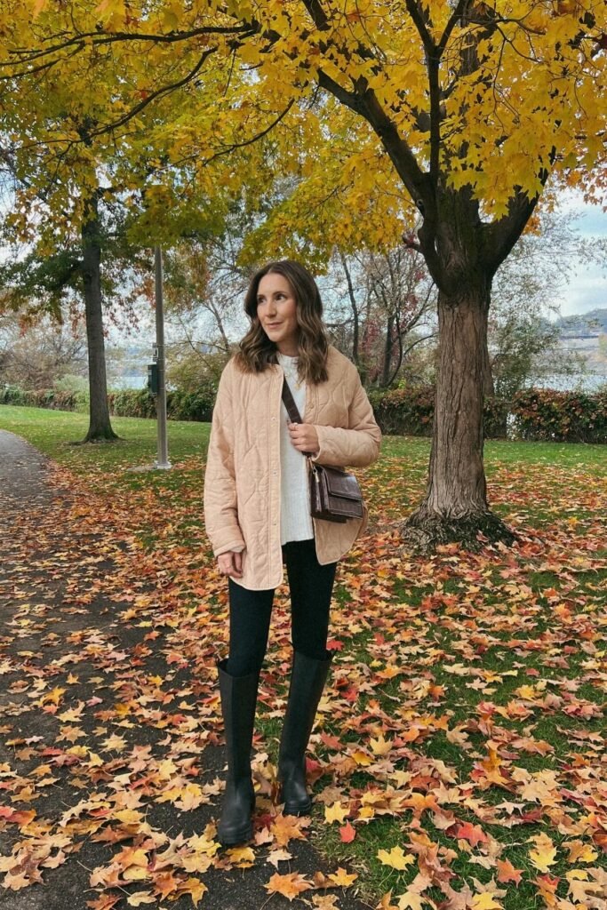 Beige Quilted Jacket + White Sweater + Black Leggings + Tall Black Boots