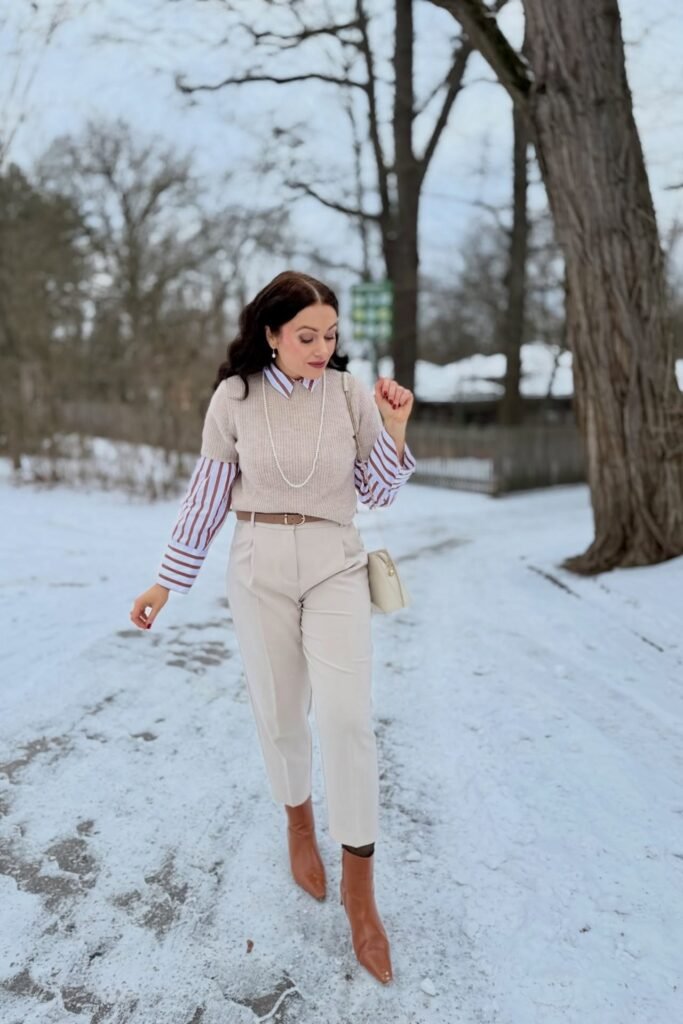 Beige Short-Sleeve Sweater + Striped Button-Down Shirt + Cream Trousers + Tan Pointed Boots