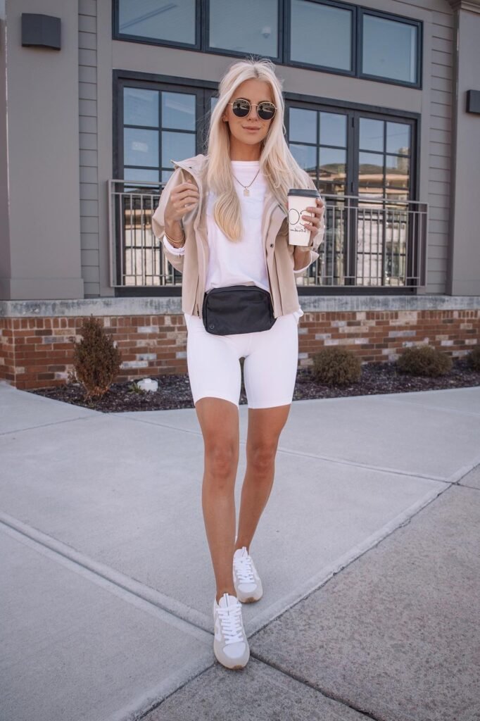 Beige Windbreaker Jacket + White T-Shirt + White Biker Shorts + White Sneakers