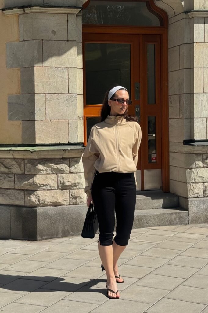 Beige Zip-Up Windbreaker + Black Capri Leggings + Black Thong Heeled Sandals