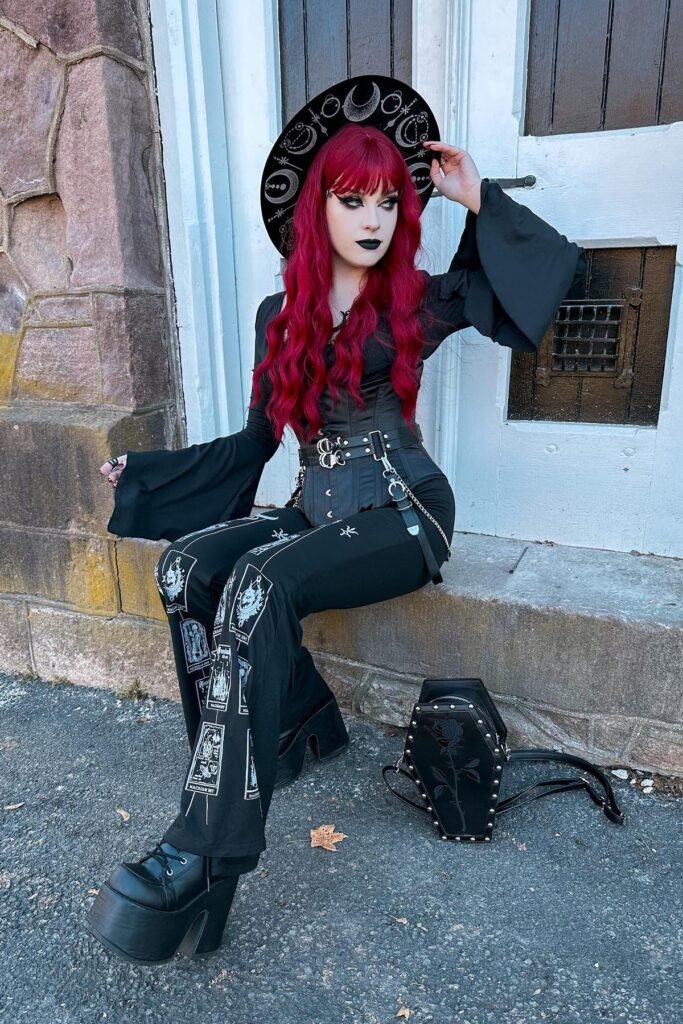 Black Bell-Sleeve Top + Tarot Print Flared Trousers + Black Corset Belt + Black Platform Boots