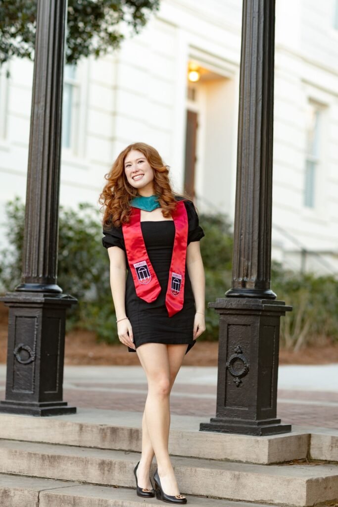 Black Bodycon Mini Dress + Red Graduation Stole + Black Wedge Heels