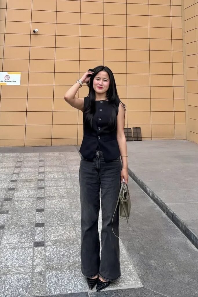 Black Button-Up Vest + Faded Black Wide-Leg Jeans + Pointed Black Heels