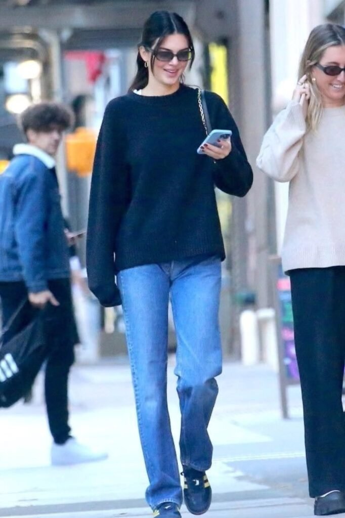 Black Crewneck Sweater + Classic Blue Jeans + Black Sneakers