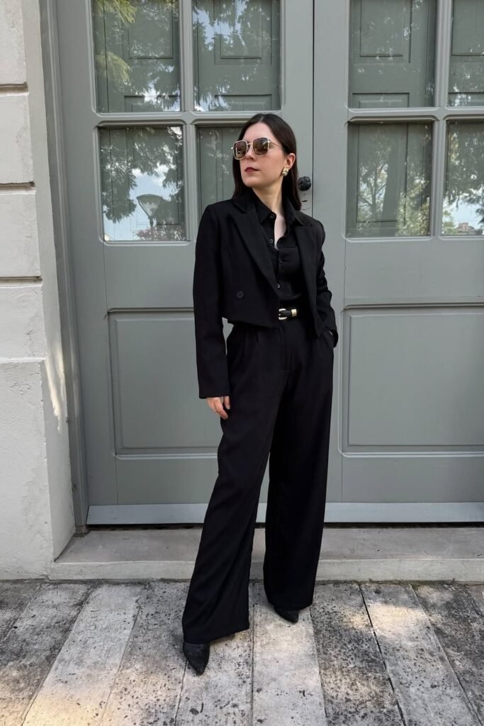 Black Cropped Blazer + Black Button-Down Shirt + Black Wide-Leg Trousers + Black Pointed Boots