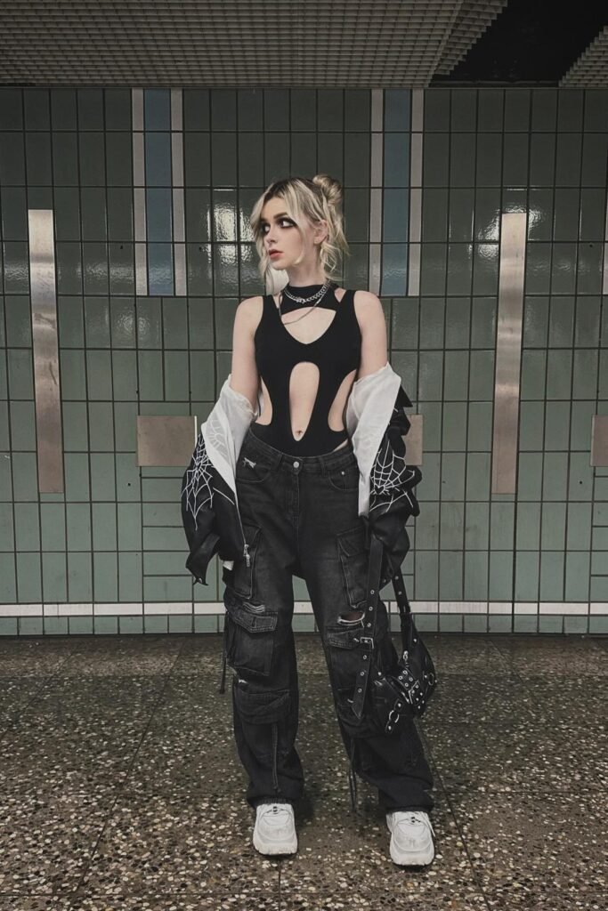 Black Cut-Out Bodysuit + Oversized Black Cargo Jeans + Spiderweb Print Jacket + White Chunky Sneakers