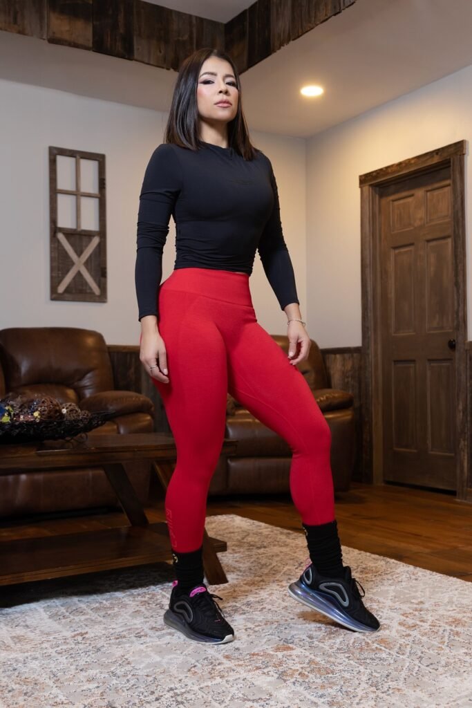 Black Fitted Long Sleeve Top + Red High-Waisted Leggings + Black Sneakers