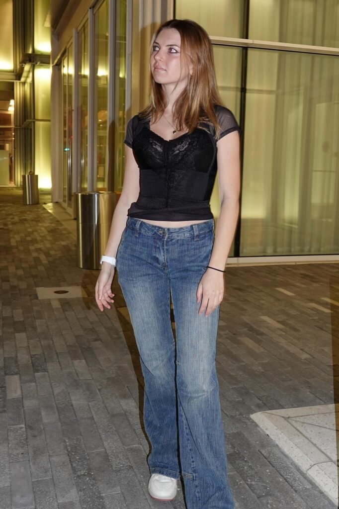 Black Lace Corset Top + Blue Flare Jeans + White Sneakers