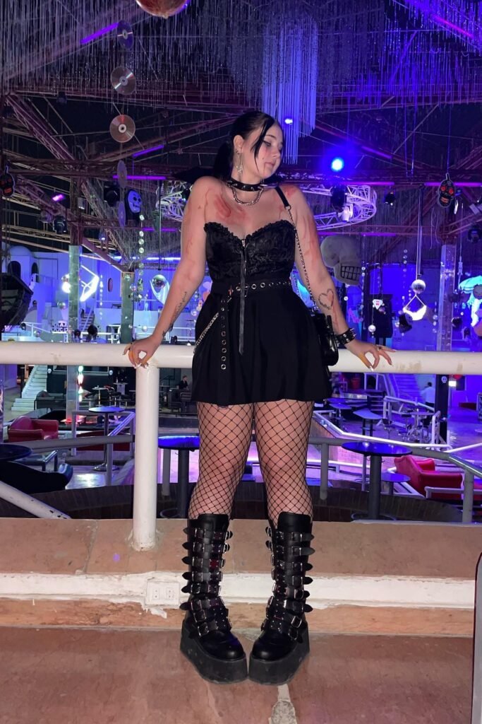 Black Lace Corset Top + Pleated Mini Skirt + Fishnet Tights + Multi-buckle Platform Boots