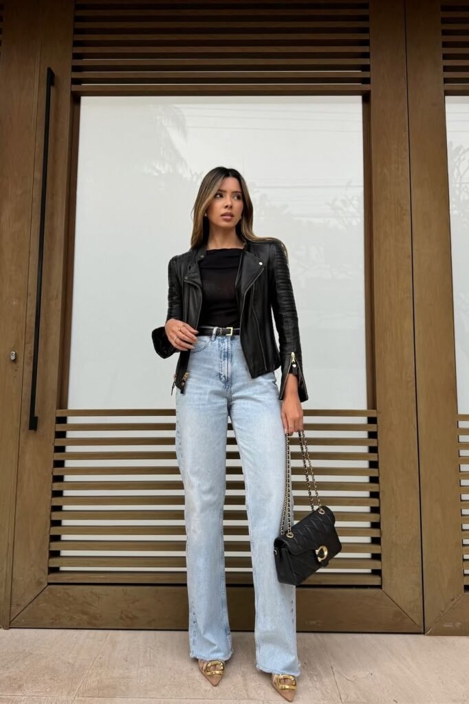 Black Leather Biker Jacket + Black Top + Light Wash Straight Jeans + Tan Buckled Heels