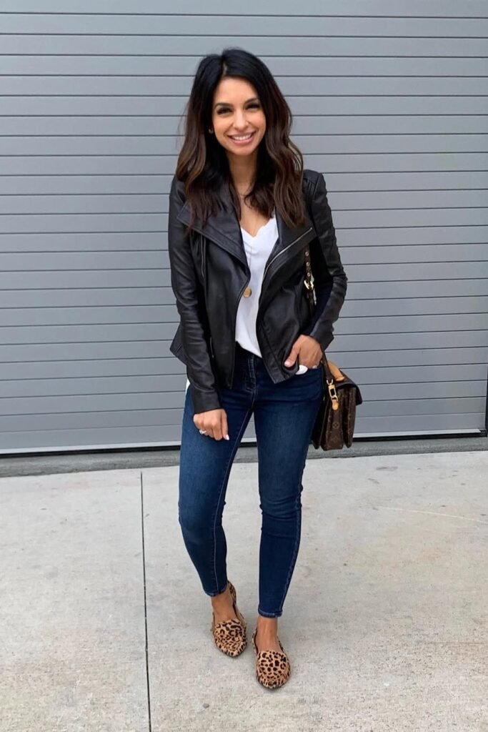 Black Leather Biker Jacket + White V-Neck Tee + Dark Wash Skinny Jeans + Leopard Print Loafers