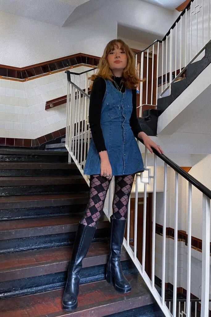 Black Long-Sleeve Mock Neck Top + Denim Pinafore Mini Dress + Argyle Pattern Tights + Black Platform Knee-High Boots
