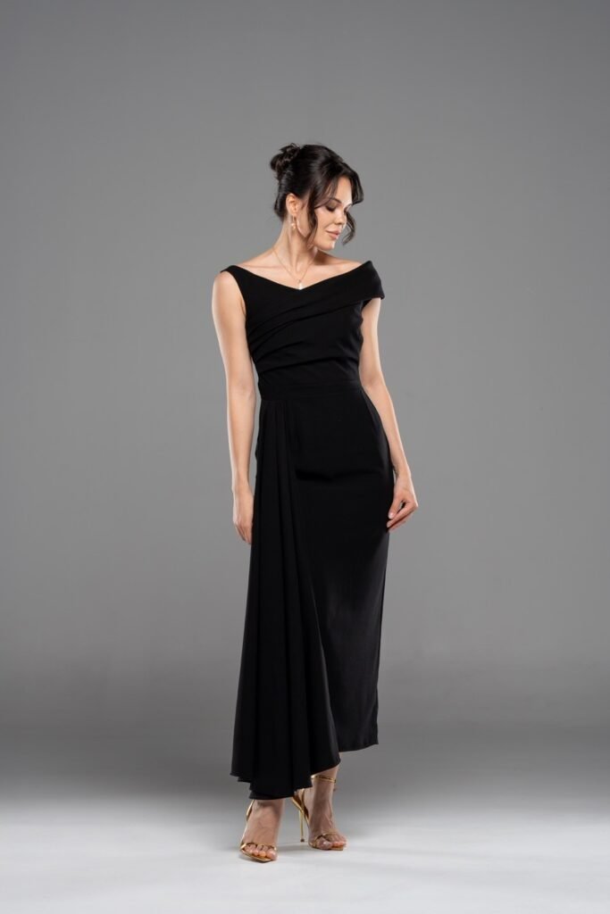 Black Off-the-Shoulder Draped Column Dress + Gold Strappy Heeled Sandals