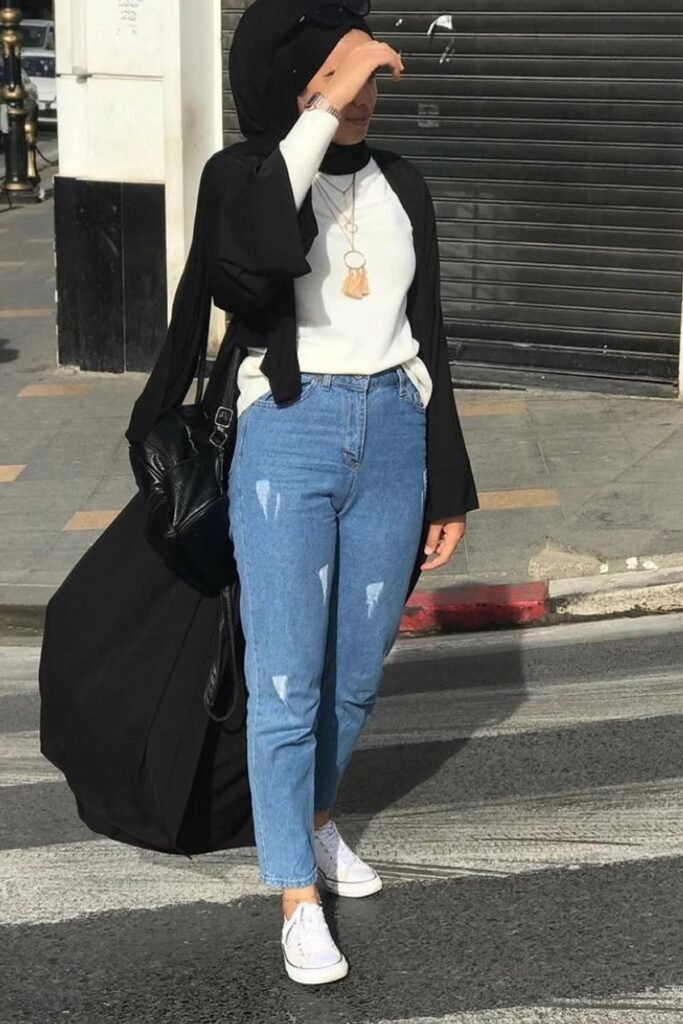 Black Open Abaya + White Long-Sleeve Top + Light Wash Distressed Jeans + White Sneakers