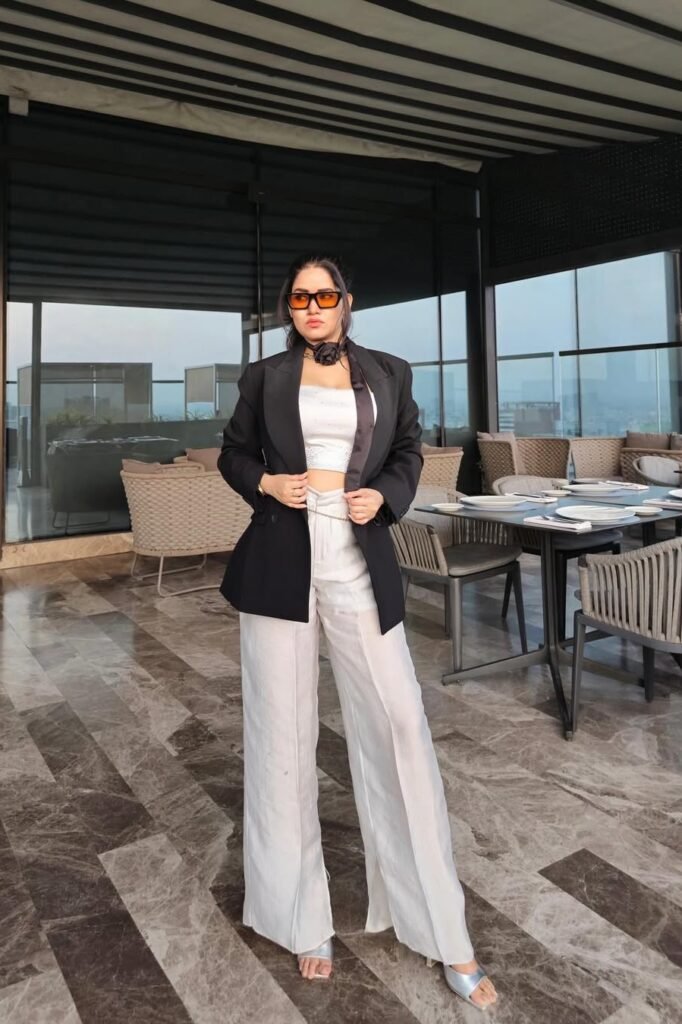 Black Oversized Blazer + White Sequin Crop Top + White Wide-Leg Trousers + Silver Sandals