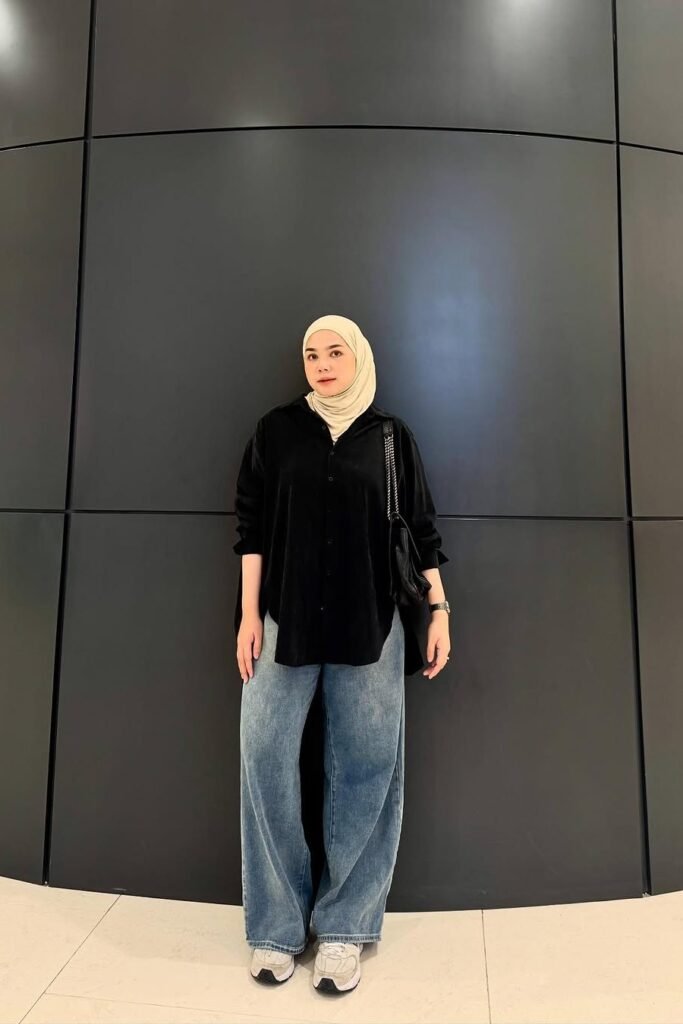 Black Oversized Velvet Shirt + Medium Wash Wide-Leg Jeans + White Athletic Sneakers