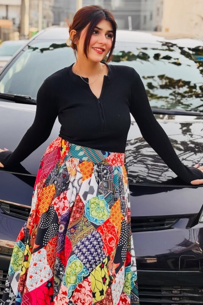 Black Ribbed Quarter-Zip Top + Vibrant Patchwork Maxi Skirt