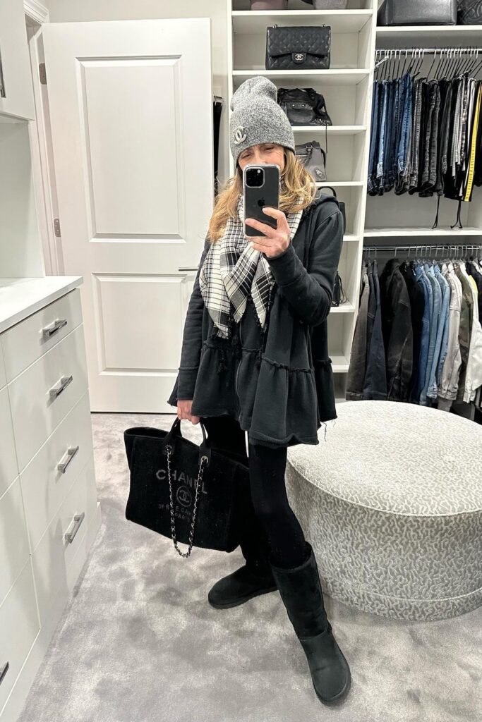 Black Ruffle-Hem Cardigan + Black Leggings + Black Tall Sheepskin Boots