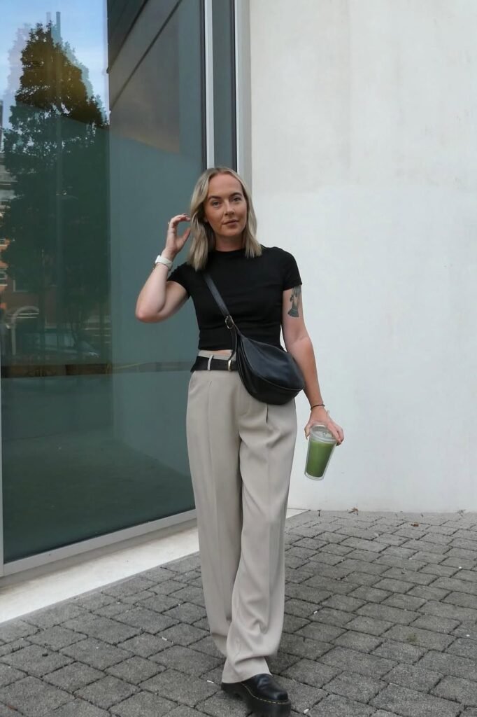 Black Short-Sleeve Baby Tee + Beige Pleated Trousers + Black Belt + Black Platform Boots