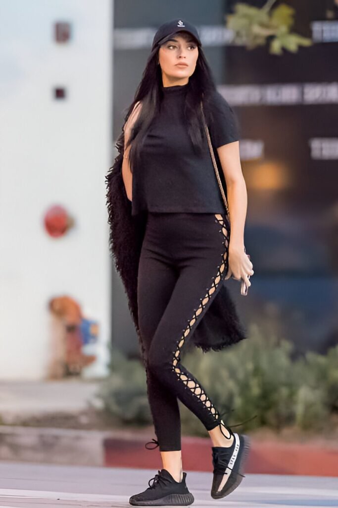 Black Short-sleeve Mock Neck Top + Black Lace-up Leggings + Black Athletic Shoes