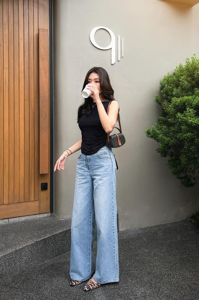Black Sleeveless Mock-Neck Top + Light Wash Wide-Leg Jeans + Leopard Print Flats