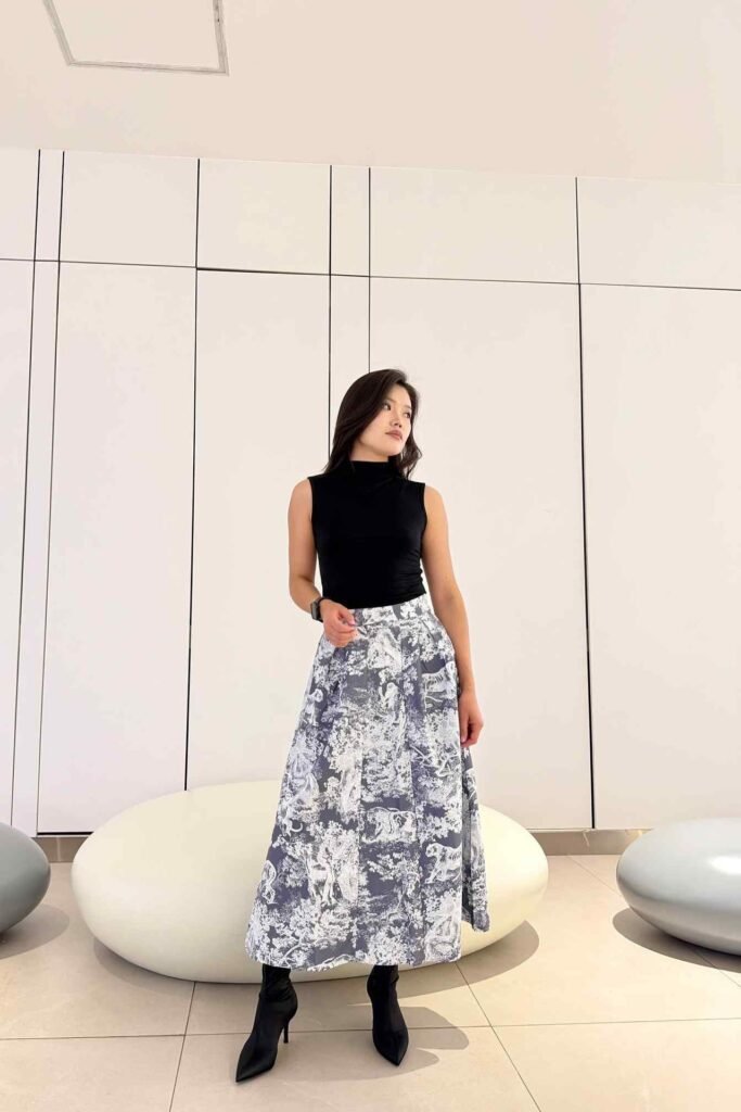 Black Sleeveless Turtleneck + Blue Toile de Jouy Maxi Skirt + Black Pointed Boots