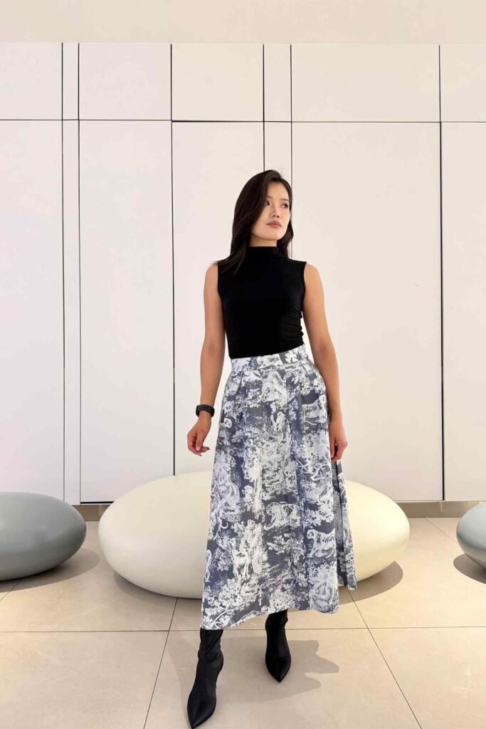 Black Sleeveless Turtleneck + Blue and White Toile De Jouy Maxi Skirt + Black Pointed Boots