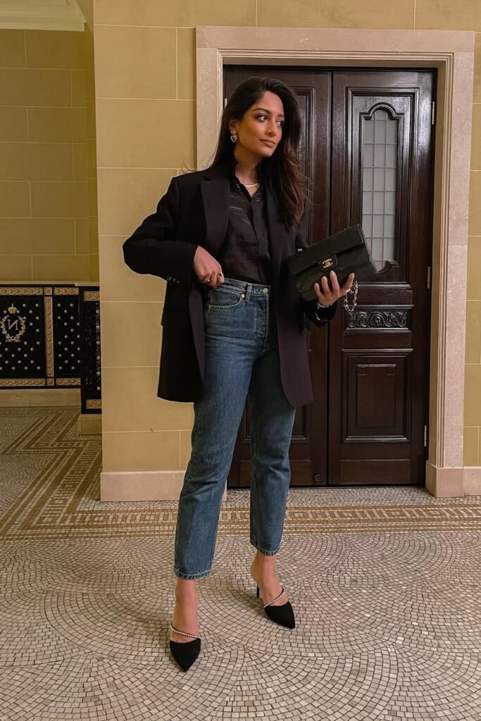 Black Structured Blazer + Black Button-Down Shirt + Dark Wash Straight-Leg Jeans + Black Crystal-Embellished Mules