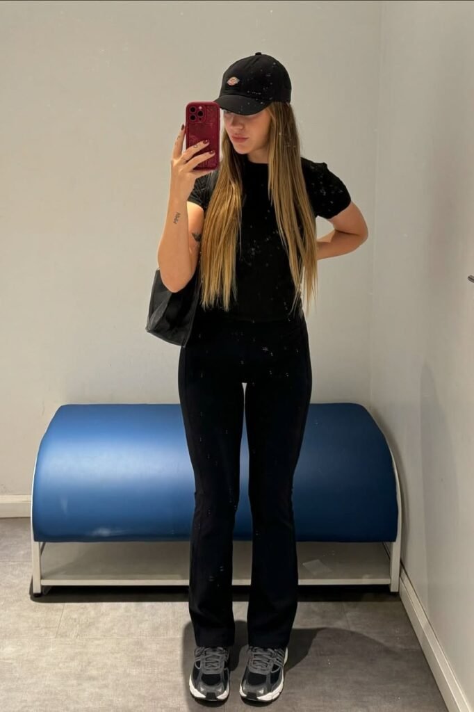 Black T-Shirt + Black Flared Yoga Pants + Grey Athletic Sneakers