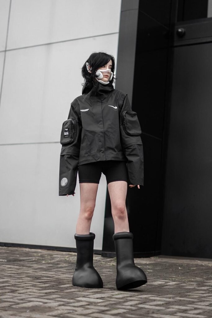 Black Technical Utility Jacket + Black Biker Shorts + Oversized Black Matte Moon Boots