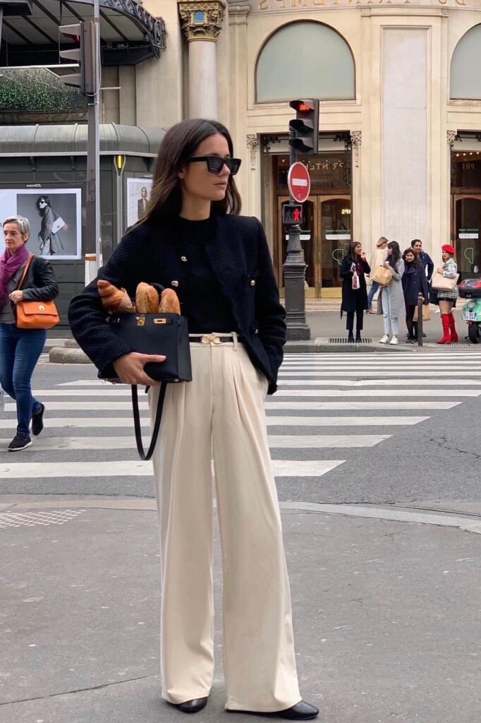 Black Textured Cropped Jacket + Black Top + Cream Pleated Trousers