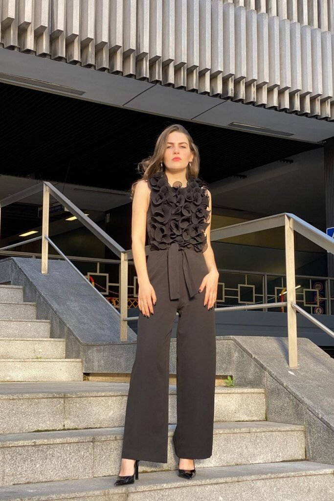 Black Textured Ruffle Jumpsuit + Black Pointed-Toe Pumps