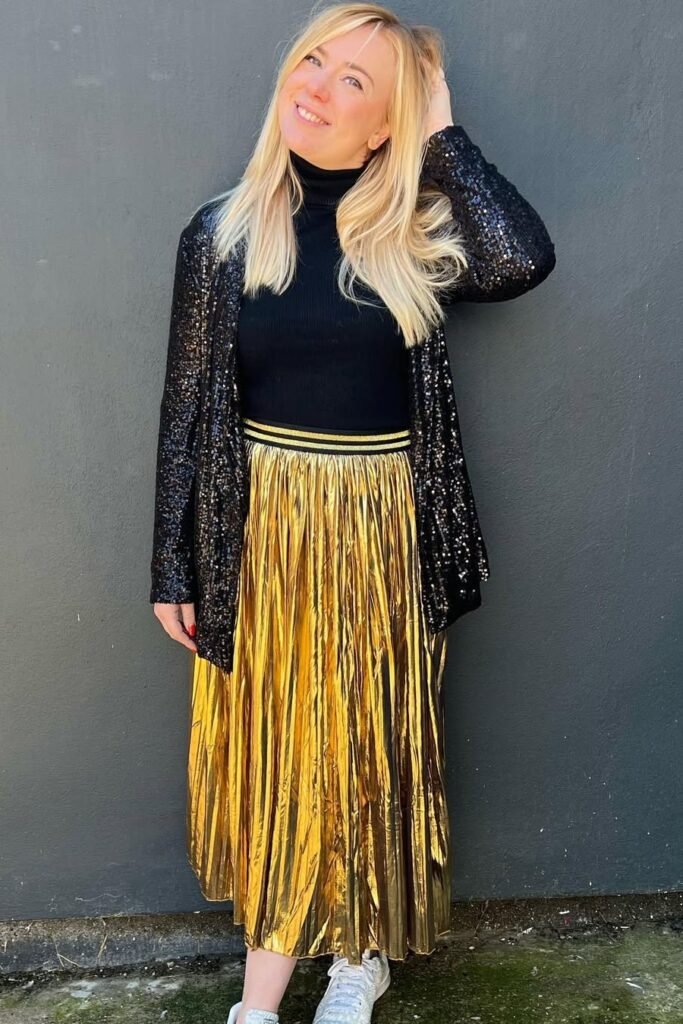 Black Turtleneck + Black Sequin Cardigan + Gold Pleated Maxi Skirt + White Sneakers