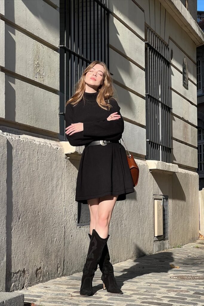 Black Turtleneck Sweater Mini Dress + Black Western Boots + Black Waist Belt