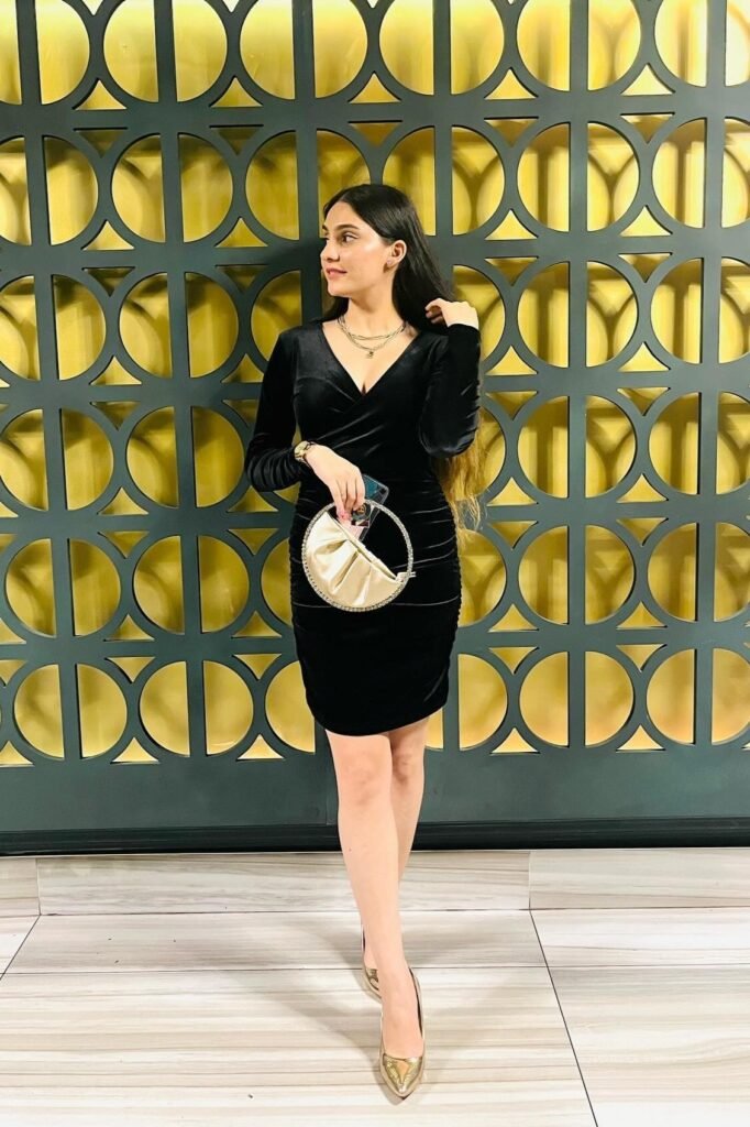 Black Velvet V-Neck Mini Dress + Gold Pointed-Toe Heels + Gold Pleated Handbag