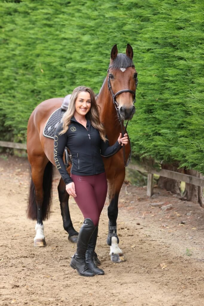 Black Zip-Up Performance Jacket + Burgundy Equestrian Breeches + Black Tall Riding Boots