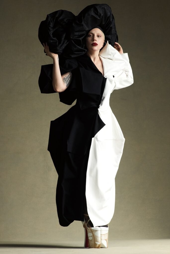 Black and White Architectural Voluminous Gown + Massive Black Fabric Headpiece + Ultra-High Platform Wedges