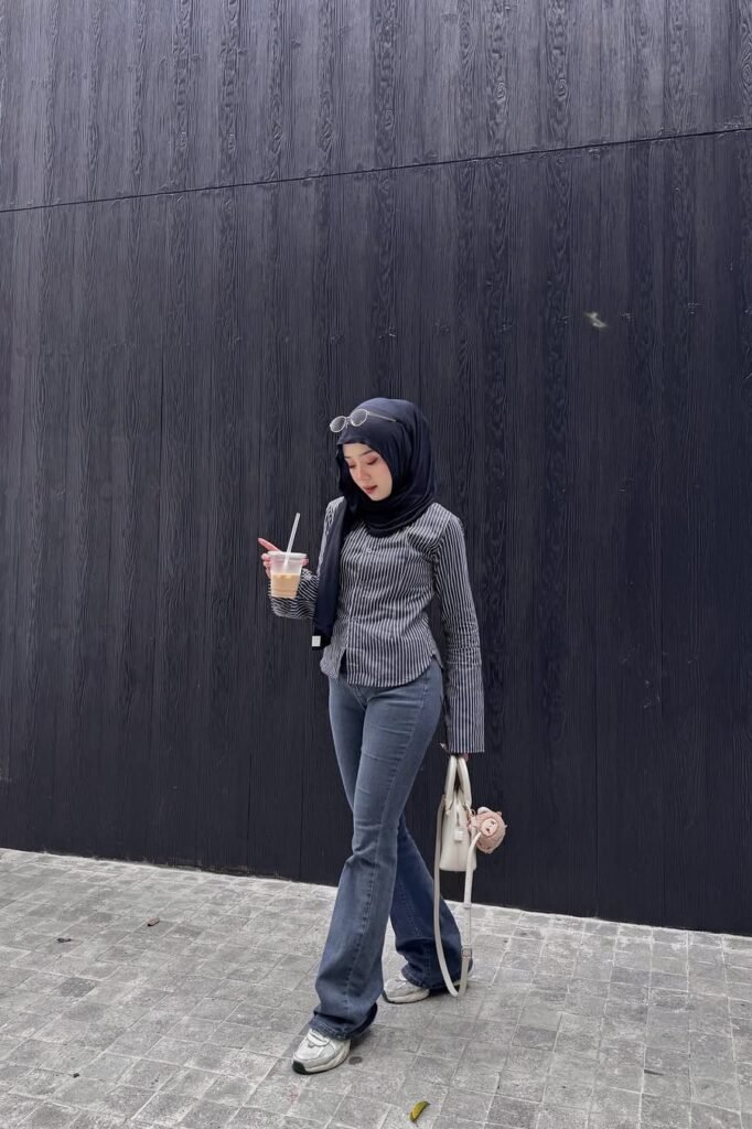 Black and White Striped Long-Sleeve Shirt + Dark Grey Flared Jeans + White Sneakers