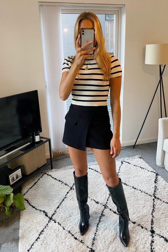 Black and White Striped Short-Sleeve Top + Black Skort + Black Knee-High Boots