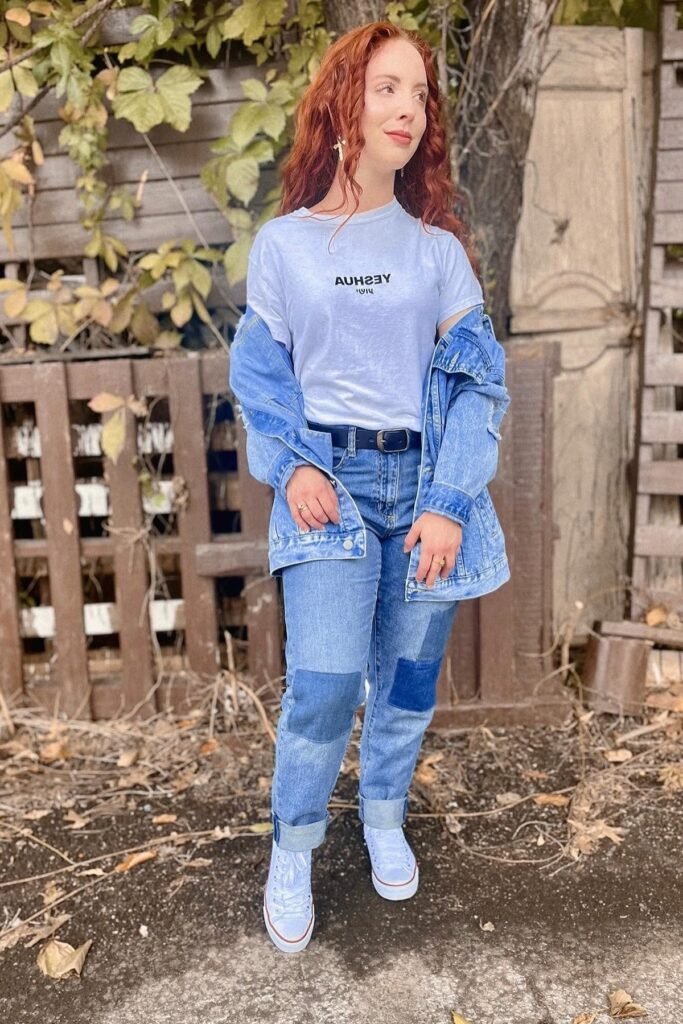 Blue Denim Jacket + White Graphic T-Shirt + Patchwork Straight-Leg Jeans + White High-Top Sneakers