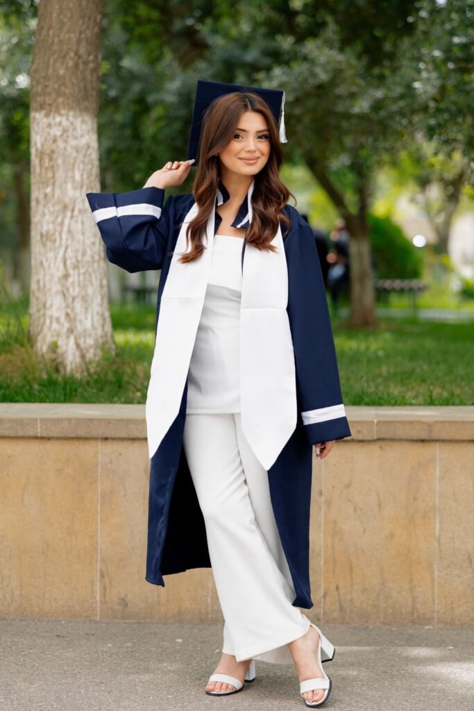 Blue Graduation Gown and Cap + White Strapless Top + White Wide-Leg Trousers + White Strappy Sandals