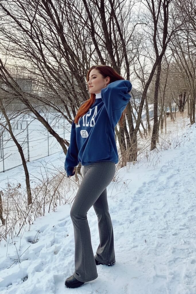 Blue Graphic Sweatshirt + Grey Flared Leggings + Black Platform Boots