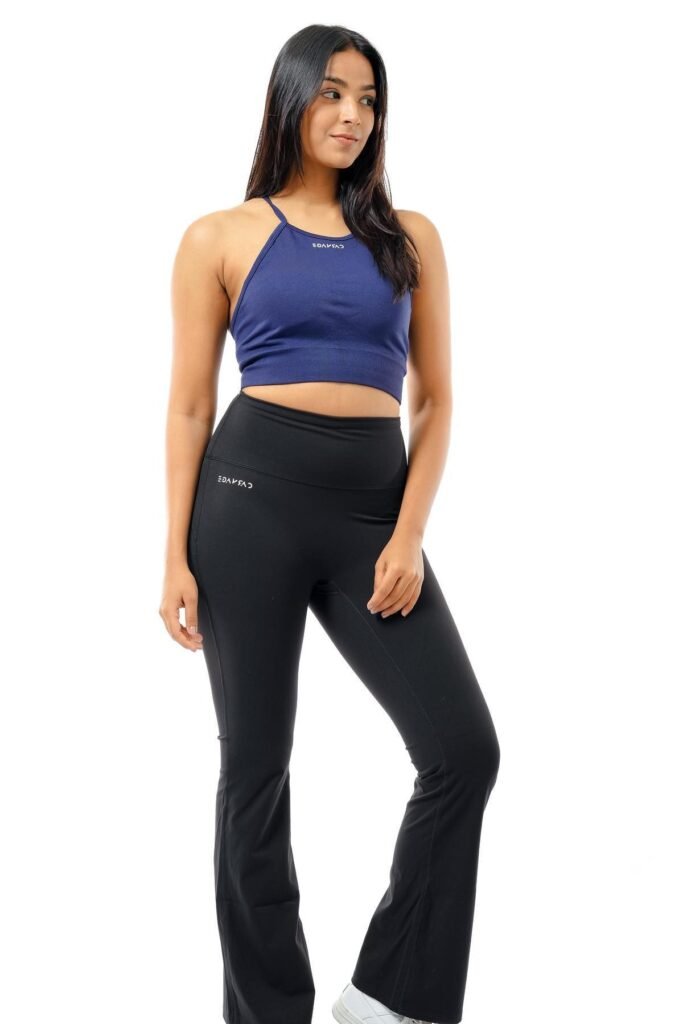 Blue Halter Sports Crop Top + Black Flared Leggings + White Sneakers