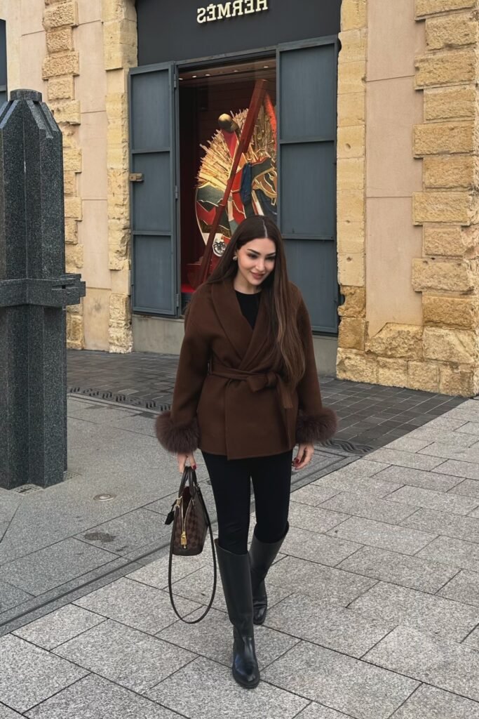 Brown Belted Coat with Fur Cuffs + Black Leggings + Tall Black Boots
